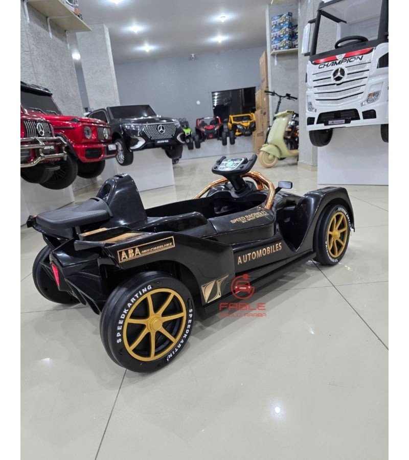 F1 Racing! 12V, Kumandalı, 2 Motor, Bluetooth Müzik,1-5 Yaşa Uygun, Direksiyondan 360 derece Dönme Özelliği